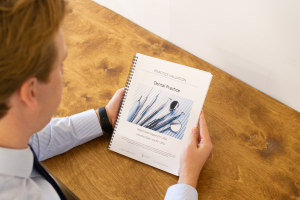 Man holds dental practice appraisal